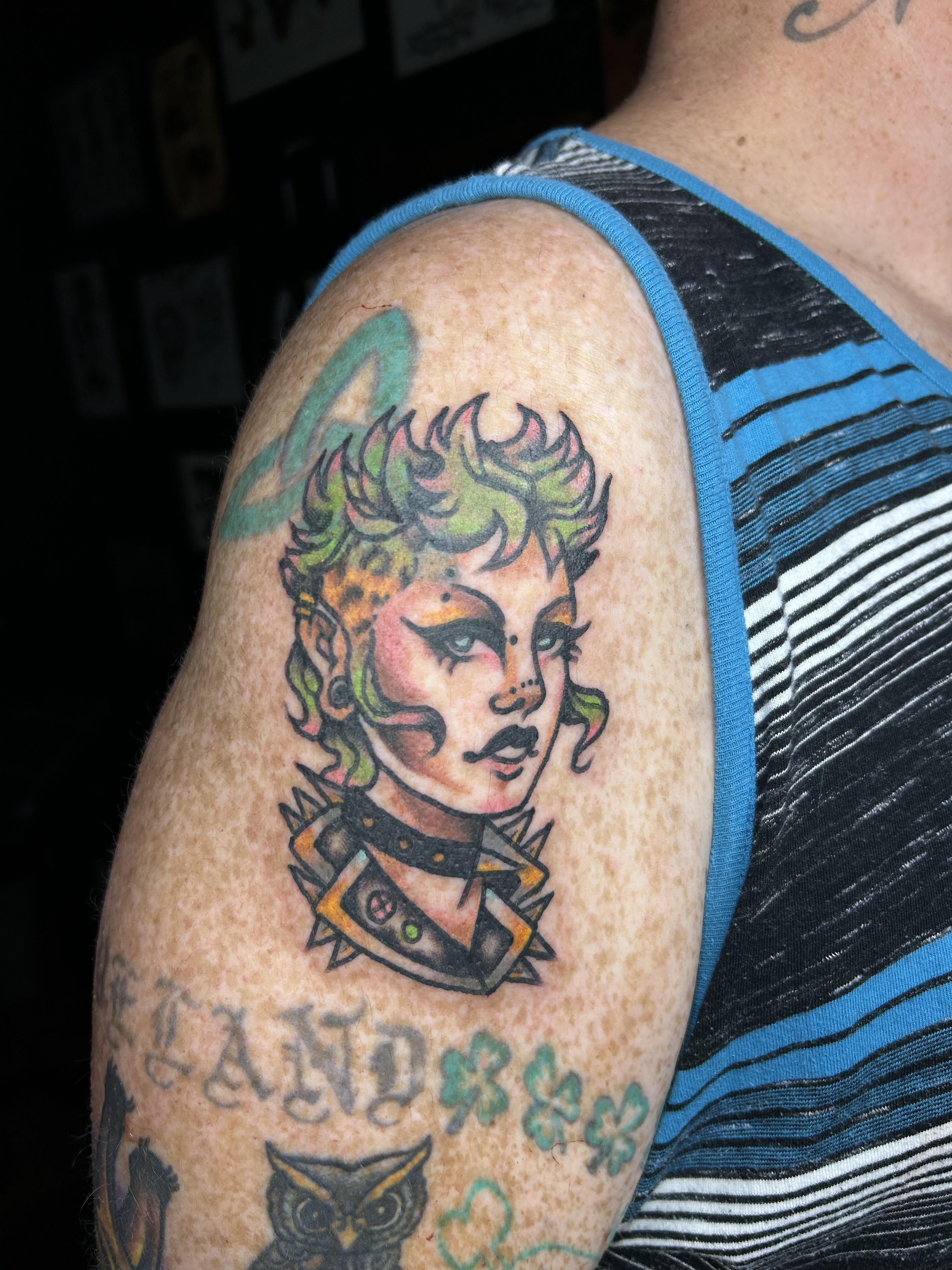 Green hair portrait tattoo by Leo Gielow who works at Resilience Body Arts in Maynard, MA