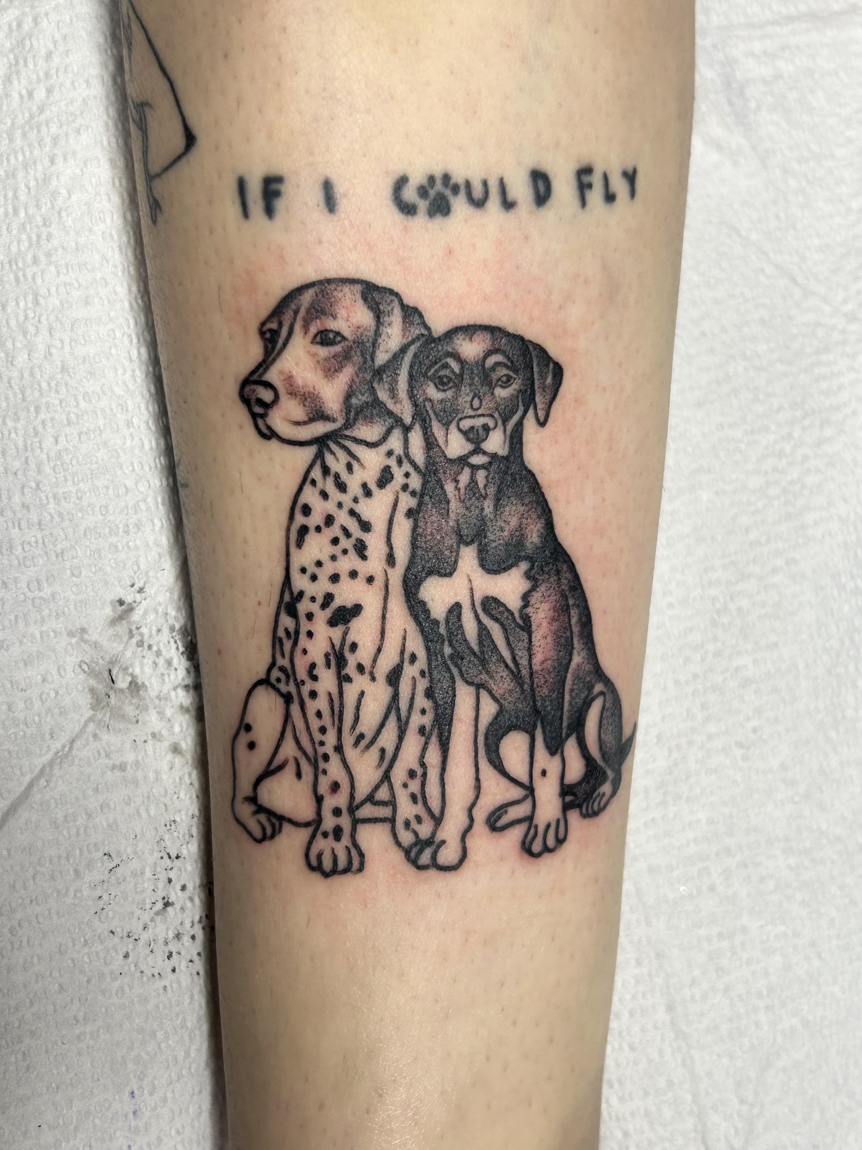Two dogs with quote tattoo by Leo Gielow who works at Resilience Body Arts in Maynard, MA